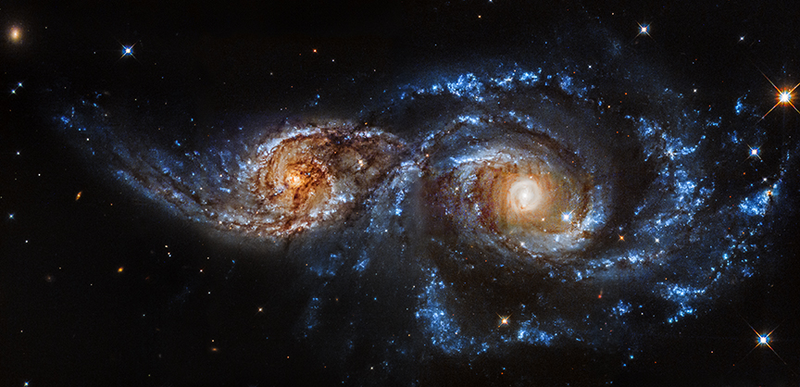 Illustration for article titled This Galactic Collision Is A Beautiful Spawning Ground For Supernovae